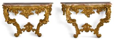 View full screen - View 1 of Lot 1. A pair of Rococo style carved giltwood console tables, probably French, late 19th century.