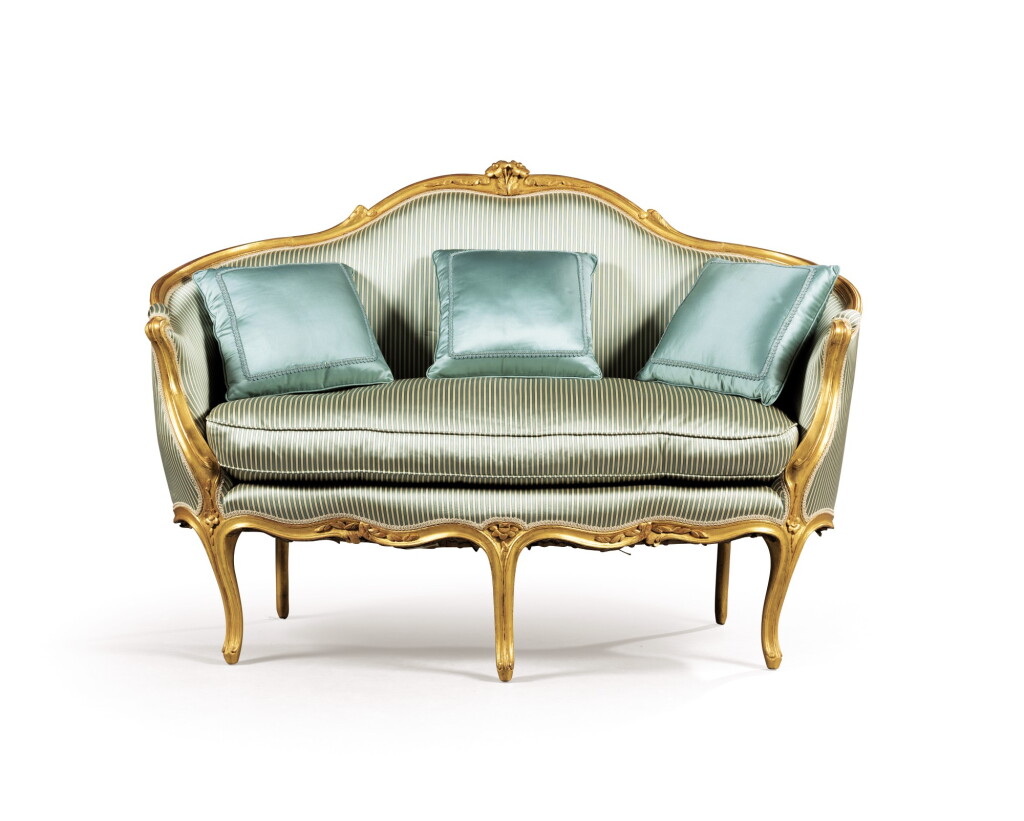 View full screen - View 1 of Lot 195. A Louis XV carved giltwood canape corbeille ; (regilt).