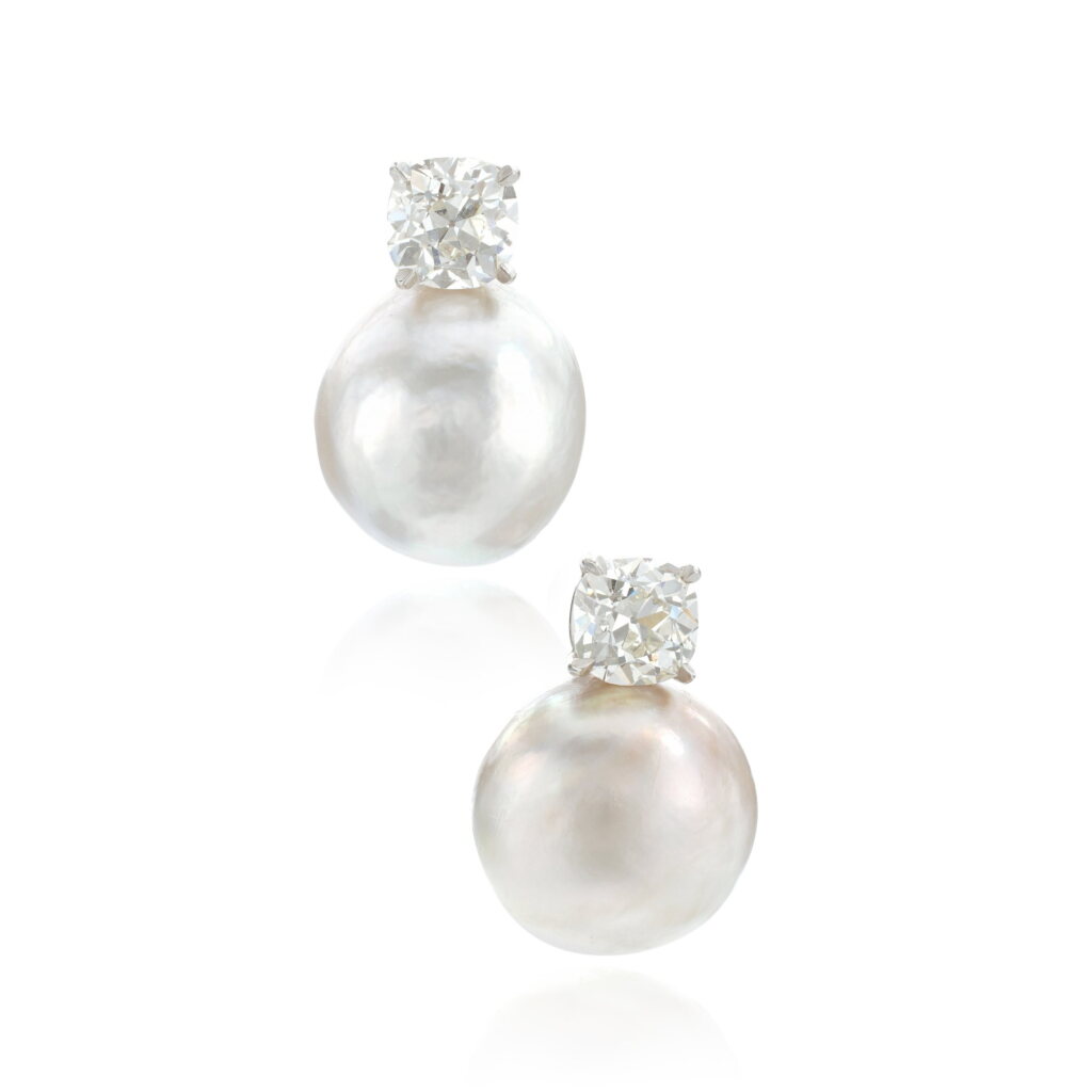 View full screen - View 1 of Lot 567. Pair of natural pearl and diamond earrings.