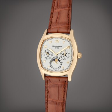 View full screen - View 1 of Lot 236. Reference 5940J-001 | A yellow gold automatic perpetual calendar wristwatch with moon phases and leap year indication, Circa 2015.