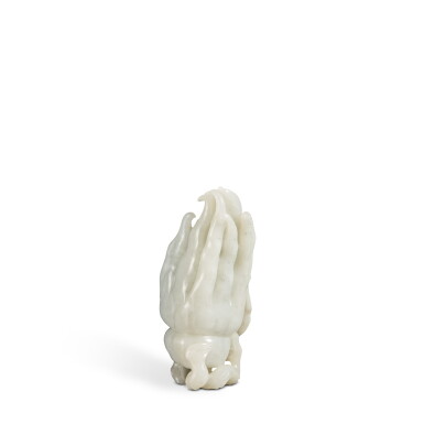 View full screen - View 1 of Lot 47. A celadon jade carving of a finger citron, Qing dynasty, 18th / 19th century .