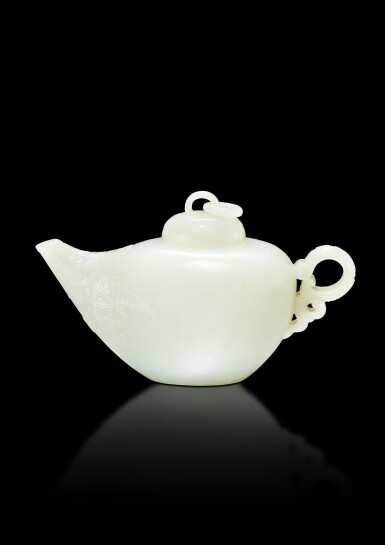 View full screen - View 1 of Lot 3651. A very rare white jade teapot and cover, Yuyong mark and period of Jiaqing | 清嘉慶 白玉刻仿古紋活環鈕蓋壺 《嘉慶御用》款.
