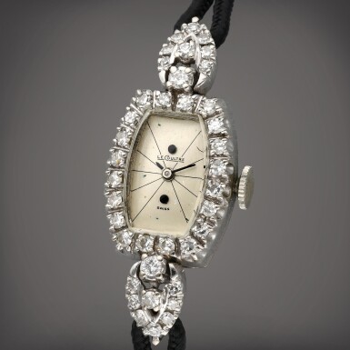 View full screen - View 1 of Lot 466. A white gold and diamond-set wristwatch, Circa 1950.