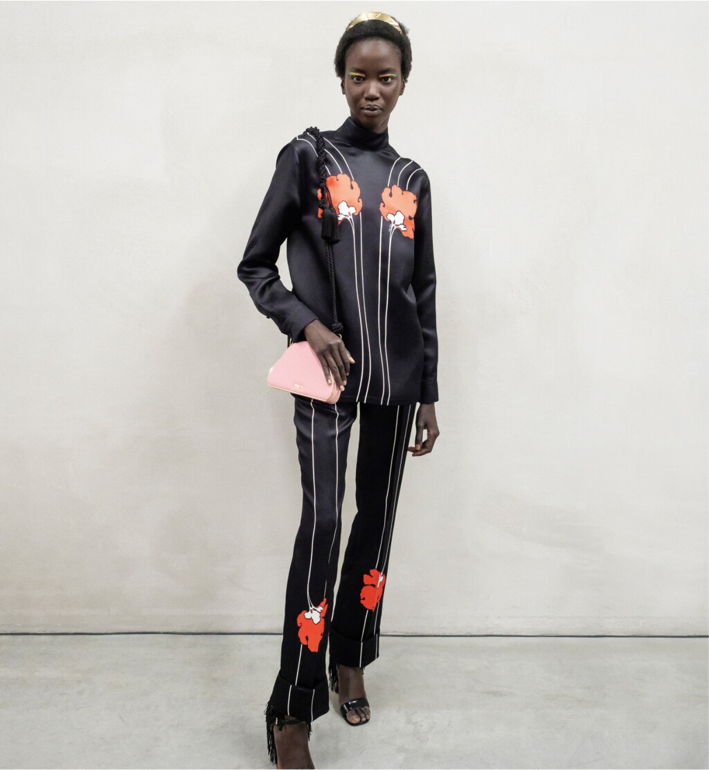 View full screen - View 1 of Lot 35. PRADA | PEONY PRINT SILK PYJAMAS, ECLIPSE BAG, METAL HEADBAND, OPEN-TOE HIGH HEEL SANDALS WORN BY ANOK YAI.