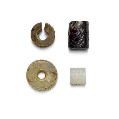 View full screen - View 1 of Lot 13. A group of three small jade and hardstone beads and a small stone split disc Qing dynasty | 清 各式珮飾一組三件 及 石玦.