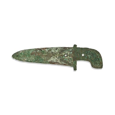 View full screen - View 1 of Lot 896. An archaic bronze turquoise-inlaid dagger axe (Ge), Shang dynasty | 商 青銅嵌綠松石饕餮紋曲內戈.