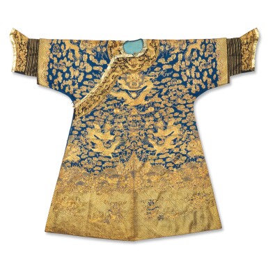 View full screen - View 1 of Lot 627. A blue-ground silk embroidered 'dragon' robe (Jifu), Late Qing dynasty | 清末 藍地繡暗八仙雲龍紋吉服袍.