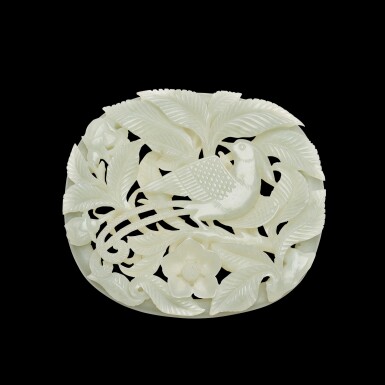 View full screen - View 1 of Lot 189. A reticulated pale celadon 'bird and flower' plaque, Yuan / Ming dynasty | 元 / 明 青白玉鏤雕花鳥紋帶板.
