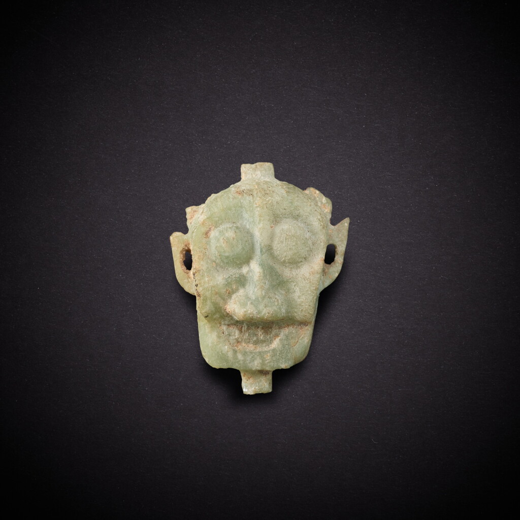 View full screen - View 1 of Lot 6812. A rare hardstone Shaman's head, Neolithic period, probably Jinsha culture | 新石器時代 或金沙文化 石雕巫師首像.