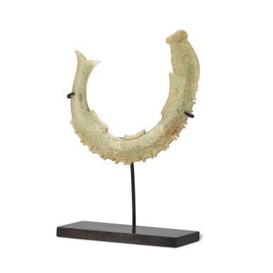 View full screen - View 1 of Lot 465. A celadon jade 'fish' pendant, Shang dynasty - Warring States period or later 商至戰國或以後 青玉魚形珮.