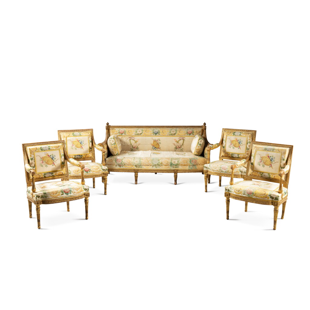 View full screen - View 1 of Lot 65. A Louis XVI giltwood furniture set from Fontainebleau, stamped by George Jacob, circa 1780-1785 | Mobilier de salon en bois sculpté et doré d'époque Louis XVI provenant du château de Fontainebleau, estampille de Georges Jacob, vers 1780-1785.