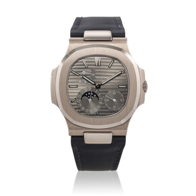 View full screen - View 1 of Lot 130. Reference 5712 Nautilus | A white gold automatic wristwatch with date, moon phases and power reserve indication, Circa 2013 | 百達翡麗 5712 型號 Nautilus | 白金自動上鏈腕錶備日期、月相及動力儲存顯示,約2013年製.