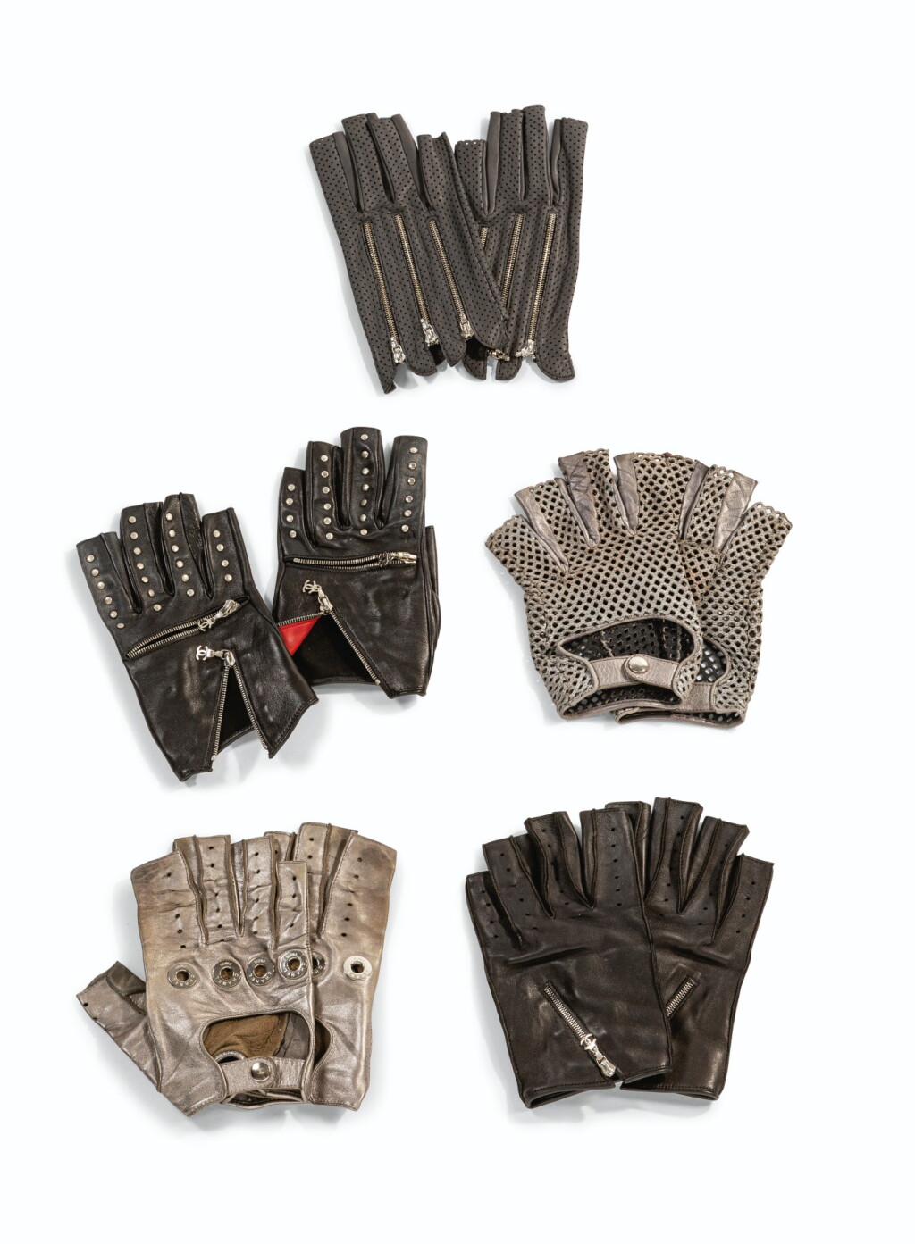 View full screen - View 1 of Lot 710. Five Pairs of Lambskin Gloves, circa 2000 | Cinq paires de mitaines en agneau, circa 2000.