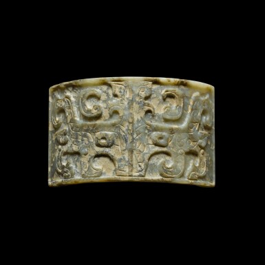 View full screen - View 1 of Lot 169. A jade 'taotie' plaque, Zhou dynasty | 周 玉饕餮紋珮.