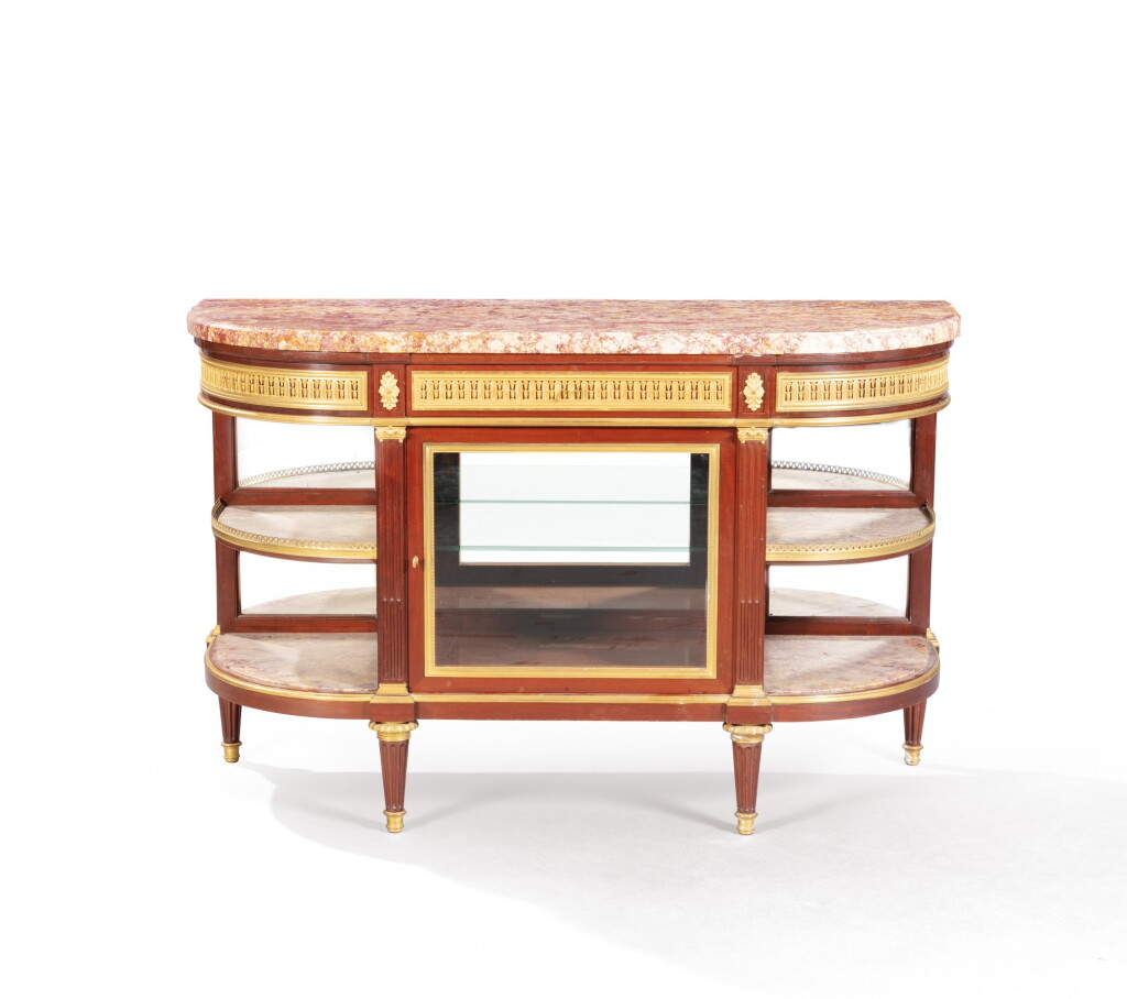View full screen - View 1 of Lot 185. A Louis XVI style gilt-bronze mounted and mahogany console desserte .