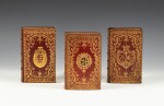 Réunion de trois volumes en maroquin rouge aux armes ornés de plaque de Dubuisson.