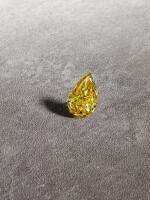 Unmounted Fancy Deep Orangy Yellow Diamond