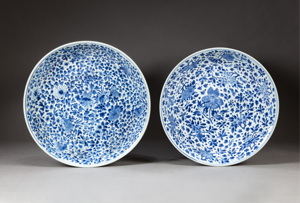 View full screen - View 1 of Lot 180. A pair of blue and white 'flower' dishes, Early Qing dynasty, 17th century | 清初十七世紀 青花花卉紋盤一對.