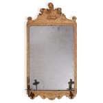 A George I carved giltwood and gesso looking glass, circa 1720
