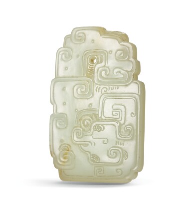 View full screen - View 1 of Lot 62. A pale celadon jade pendant, Qing Dynasty, Qianlong period | 清乾隆 青白玉仿古龍紋牌.