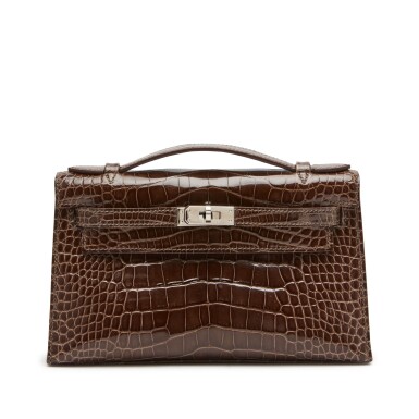 View full screen - View 1 of Lot 382. Gris Elephant Kelly Pochette in Shiny Mississippiensis Alligator Palladium Hardware, 2009.