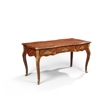 View full screen - View 1 of Lot 261. A Louis XV gilt-bronze mounted amaranth and tulipwood marquetry bureau plat, circa 1750, stamped by Antoine-Mathieu Criaerd .