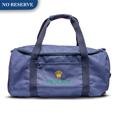 View full screen - View 1 of Lot 8020. Rolex | A blue canvas duffle bag, Circa 2011 | 勞力士 | 藍色帆布手提袋,約2011年製.