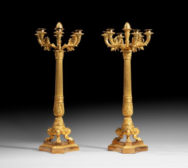 View full screen - View 1 of Lot 155. A pair of French Empire gilt-bronze candelabra, signed THOMIRE A PARIS | Paire de candélabres en bronze doré d'époque Empire, signée THOMIRE A PARIS.