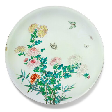 View full screen - View 1 of Lot 15. A rare large famille-rose 'chrysanthemum and butterfly' dish, Mark and period of Yongzheng | 清雍正 粉彩過墻蝶戀花紋大盤 《大清雍正年製》款.