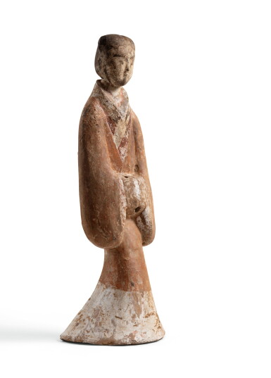 View full screen - View 1 of Lot 11. A large pottery figure of a standing lady, Han dynasty | 漢 陶女俑.