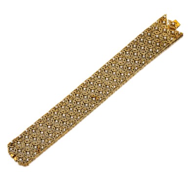 View full screen - View 1 of Lot 583. GOLD AND DIAMOND BRACELET.