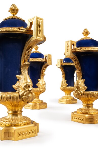 View full screen - View 1 of Lot 550. Two pairs of gilt-bronze mounted Chinese blue powder 'Medici' porcelain vases cornets and covers, the porcelain Qienlong (1736 - 1795), the mounts Louis XV, circa 1770 - 1775.