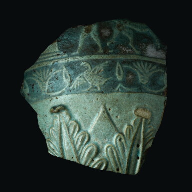 View full screen - View 1 of Lot 67. AN EGYPTIAN PALE BLUE-GREEN FAIENCE VESSEL FRAGMENT, THIRD INTERMEDIATE PERIOD/26TH DYNASTY, 1075-525 B.C..