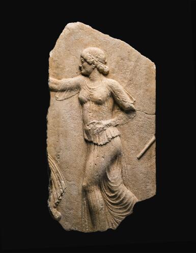 View full screen - View 1 of Lot 23. A MARBLE RELIEF FRAGMENT, 2ND QUARTER OF THE 5TH CENTURY B.C., OR LATER.