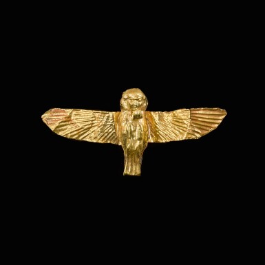 View full screen - View 1 of Lot 130. An Egyptian Gold Amulet of the Ba-bird, 30th Dynasty/Ptolemaic Period, 380/330 B.C..
