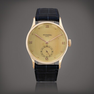 View full screen - View 1 of Lot 379. Grande Calatrava, reference 570 Montre bracelet en or rose | Pink gold wristwatch Vers 1946 | Circa 1946.