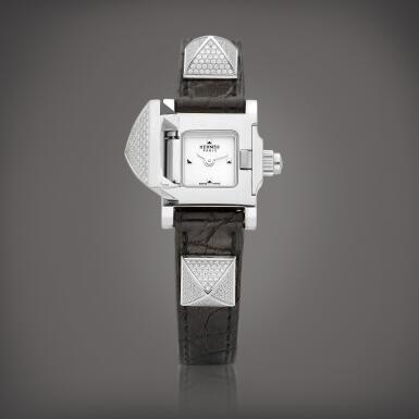 View full screen - View 1 of Lot 8904. Medor, Reference ME2.130 | A stainless steel and diamond-set wristwatch with concealed dial, Circa 2018 | 愛馬仕 | Medor 型號ME2.130 | 精鋼鑲鑽石腕錶,備隱藏式錶盤,約2018年製.
