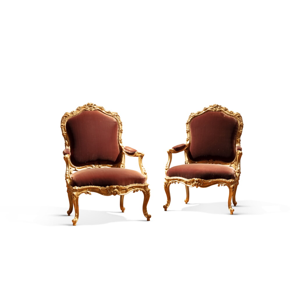 View full screen - View 1 of Lot 39. A pair of Louis XV giltwood fauteuils à la reine by Nicolas Heurtaut, circa 1755.