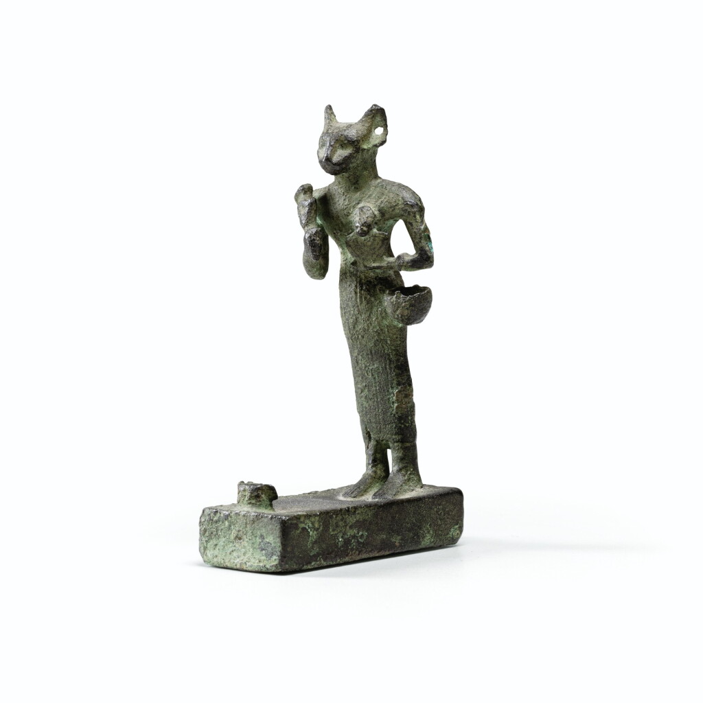 View full screen - View 1 of Lot 163. Egyptian bronze figure of Bastet, 26th dynasty, 664-525 B.C. .