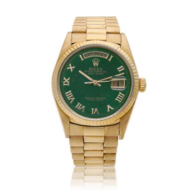 View full screen - View 1 of Lot 38. Reference 18038 Day-Date, A yellow gold automatic wristwatch with day, date, bracelet and bloodstone dial, Circa 1986.