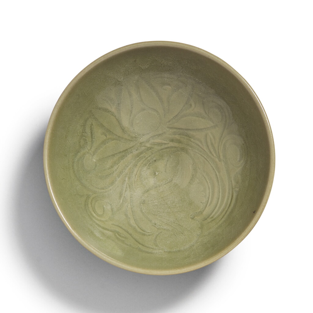 View full screen - View 1 of Lot 841. A CARVED 'YAOZHOU' CELADON-GLAZED 'LOTUS' BOWL, NORTHERN SONG DYNASTY.
