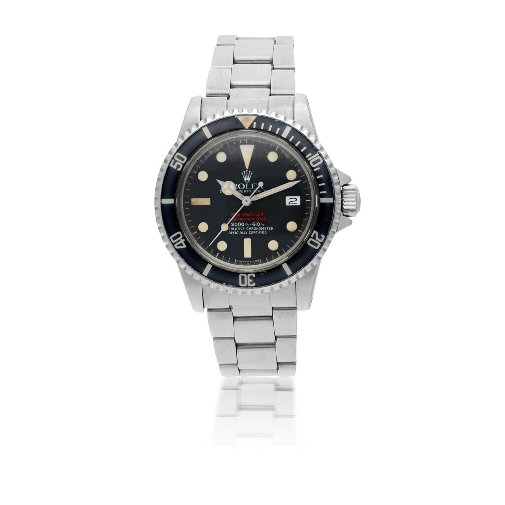 View full screen - View 1 of Lot 10. ROLEX | 'DOUBLE RED' SEA-DWELLER, REF 1665 STAINLESS STEEL WRISTWATCH WITH DATE, HELIUM ESCAPE VALVE AND BRACELET CIRCA 1977.