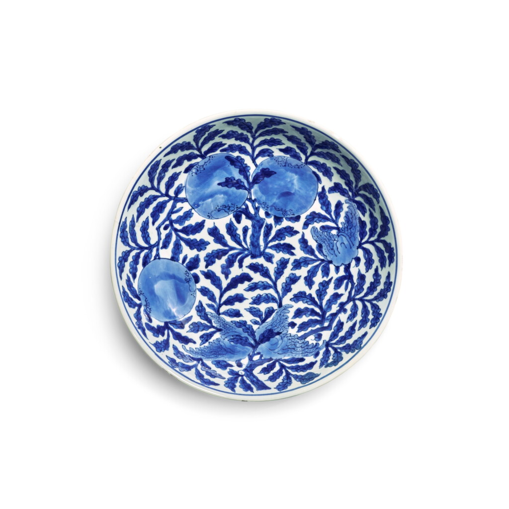 View full screen - View 1 of Lot 341. An extremely rare large blue and white 'persimmon and finger-citron' dish, Mark and period of Kangxi | 清康熙 青花福壽如意紋盤 《大清康熙年製》款.