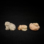 A jade 'bird' pendant, Yuan - Ming dynasty, and two jade mythical beasts, Ming dynasty 元至明 玉雕鳥形珮一件 及 明 青玉、灰玉瑞獸兩件