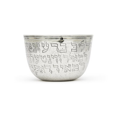 View full screen - View 1 of Lot 59. A French Silver-Gilt Beaker from a Hevra Kadisha Society , Gottfried Imlin, (Master 1726), Strasbourg, 1736-50, with Prague Control Marks for Circa 1805 and 1810-24.