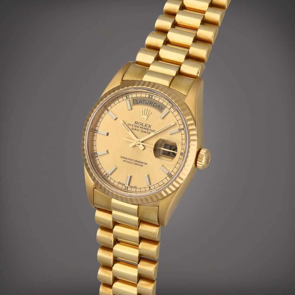 View full screen - View 1 of Lot 59. Day-Date, Reference 18238 | A yellow gold wristwatch with day, date and bracelet | Circa 1993.