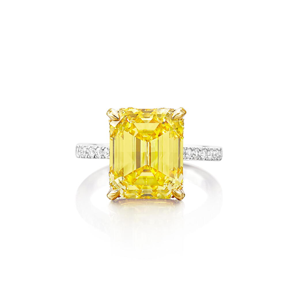 View full screen - View 1 of Lot 642. Fancy Vivid Yellow diamond ring.