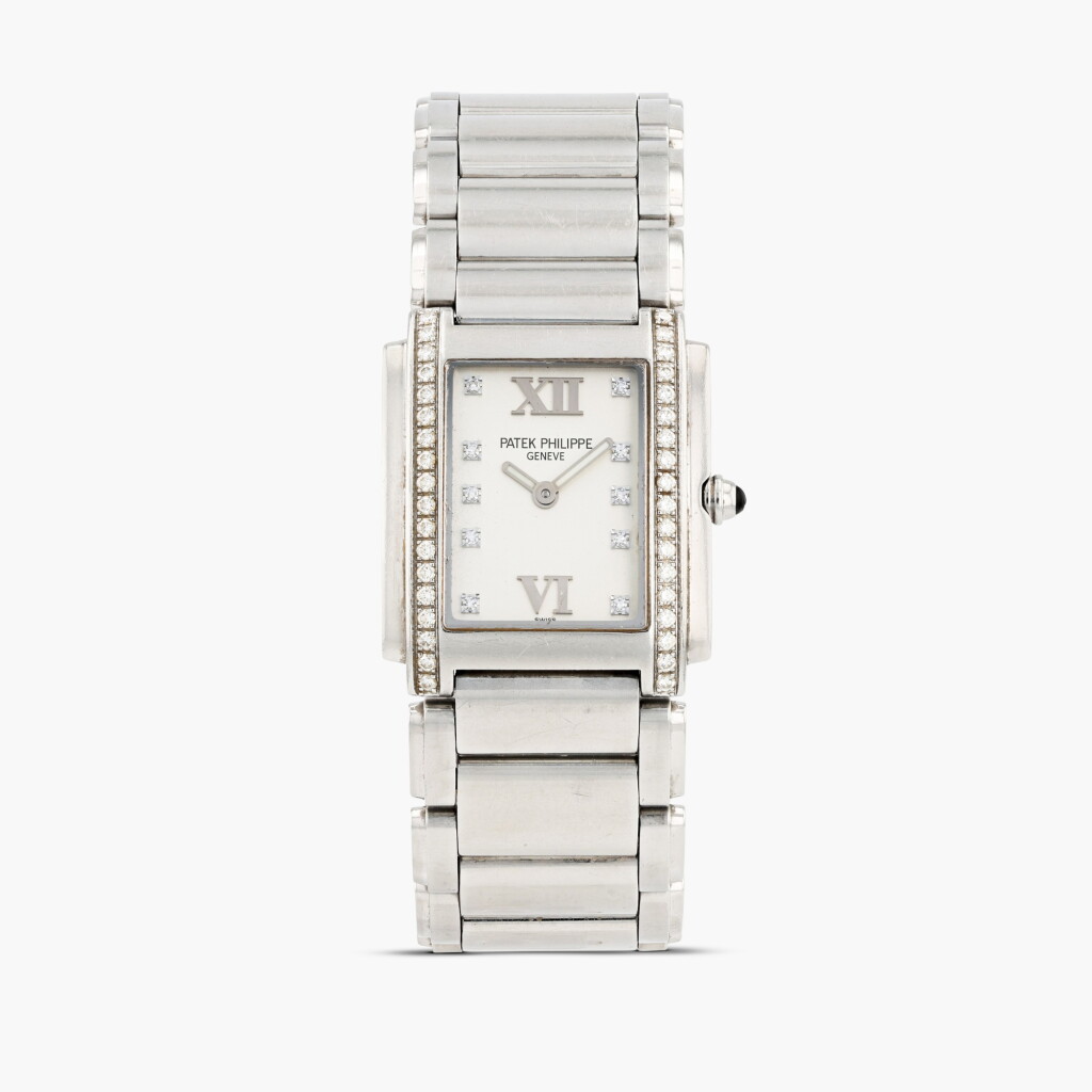 View full screen - View 1 of Lot 363. Twenty-4, reference 4910/10A-011, stainless steel and diamond-set wristwatch with bracelet, circa 1999.