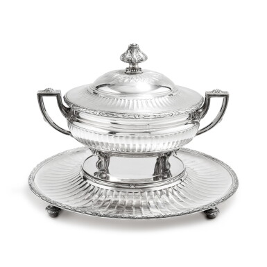 View full screen - View 1 of Lot 386. A silver soup tureen and stand in the Louis XVI style, Maison Odiot, Boulenger Successeurs, Paris, circa 1920 | Soupière et son présentoir en argent de style Louis XVI par Maison Odiot, Boulenger Successeurs, Paris, vers 1920.