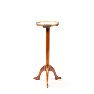 View full screen - View 1 of Lot 1044. A late Louis XV gilt-brass mounted tulipwood and mahogany veneered gueridon à crémaillère, circa 1770, stamped by François Reizell | Guéridon à crémaillère en placage de bois de rose et acajou et monture de laiton doré d'époque Louis XV, vers 1770, estampille de François Reizell.